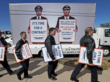 In this August 2019 photo, Southwest Airlines pilots wrapped up their picket in protest over a new labor contract at Mockingbird Lane and Cedar Springs Road in Dallas.